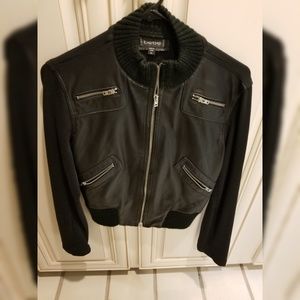 Bebe Leather jacket with zippers medium